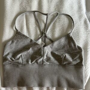 ALO Yoga Gray Sports Bra with Criss-Cross Back and Seamless Design